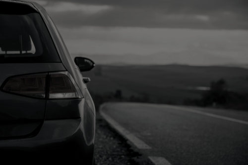 Car on road background